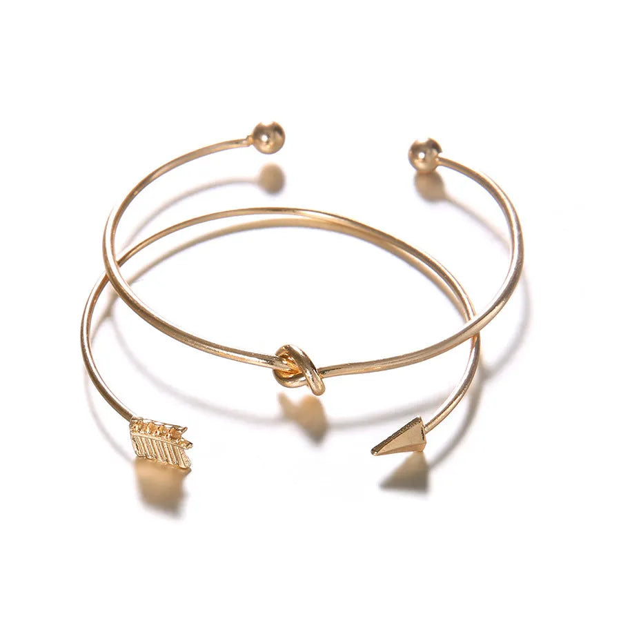 Gold vintage arrow knot cuff bracelet for women with electroplated alloy construction
