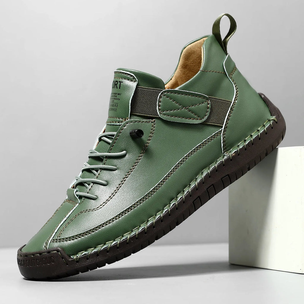 Men's mid-calf Martin boots in khaki colour with elastic band closure and tooling stitching