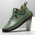 Men's mid-calf Martin boots in khaki colour with elastic band closure and tooling stitching