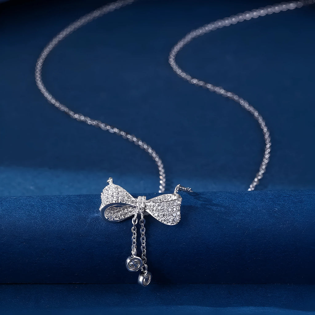 Women's S925 sterling silver bow pendant necklace on O-ring chain