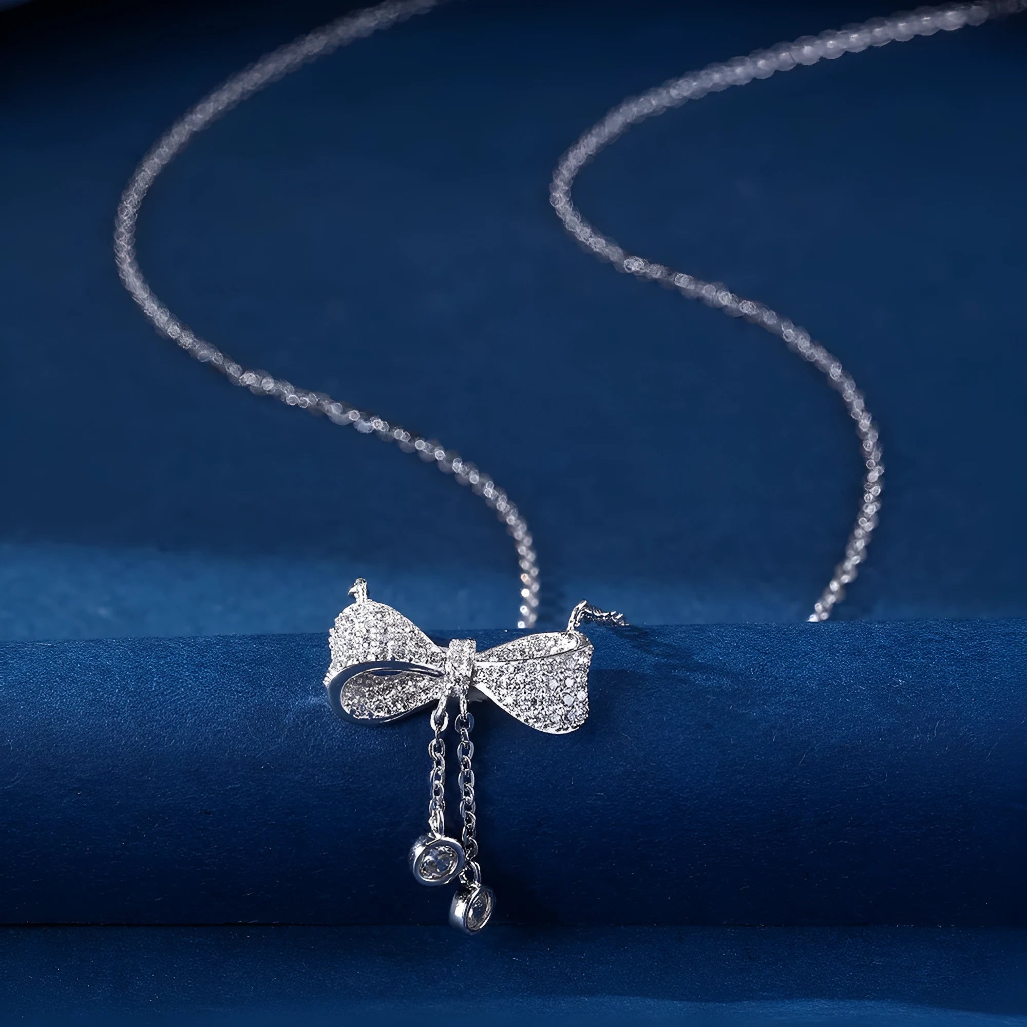 Women's S925 sterling silver bow pendant necklace on O-ring chain