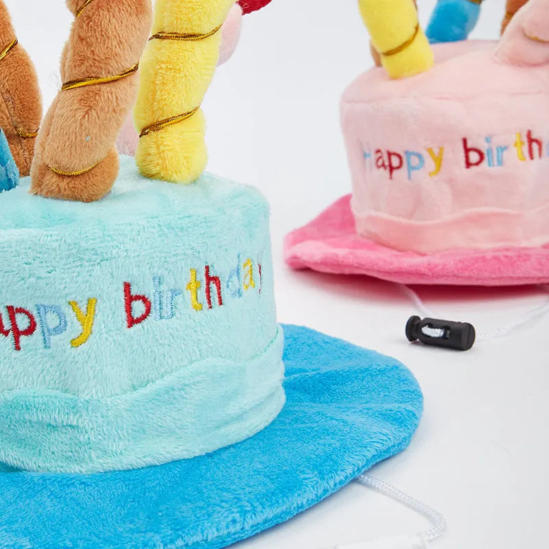 Blue or pink dog birthday hat toy for small to medium dogs on a white background.