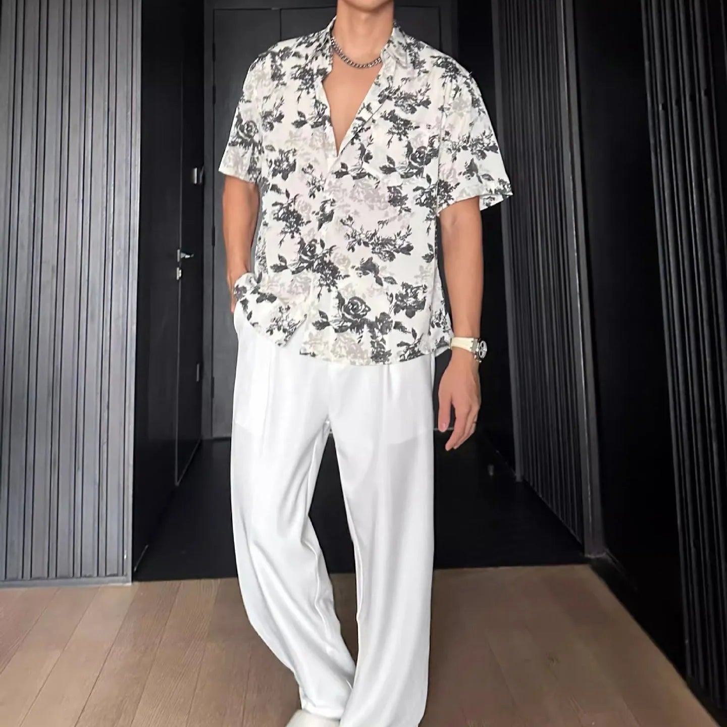 Printed floral short sleeve shirt in loose casual pendant style available in white and black colours