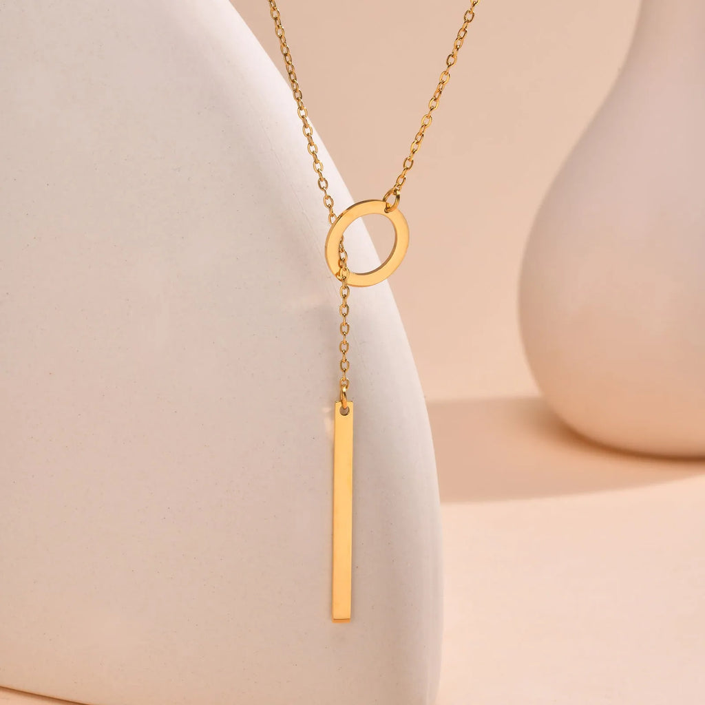 Gold stainless steel cross chain necklace with round ring pendant on O-link chain for women