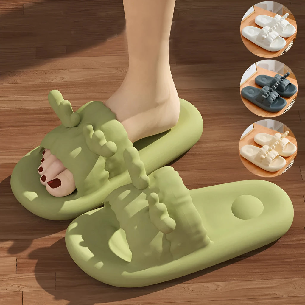 White deer horn pattern EVA flip-flop slippers with hollow-out design on a bathroom floor