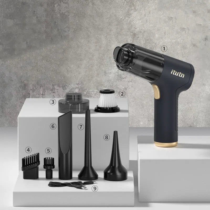 Black wireless car and home vacuum cleaner with accessories including brush heads and nozzles