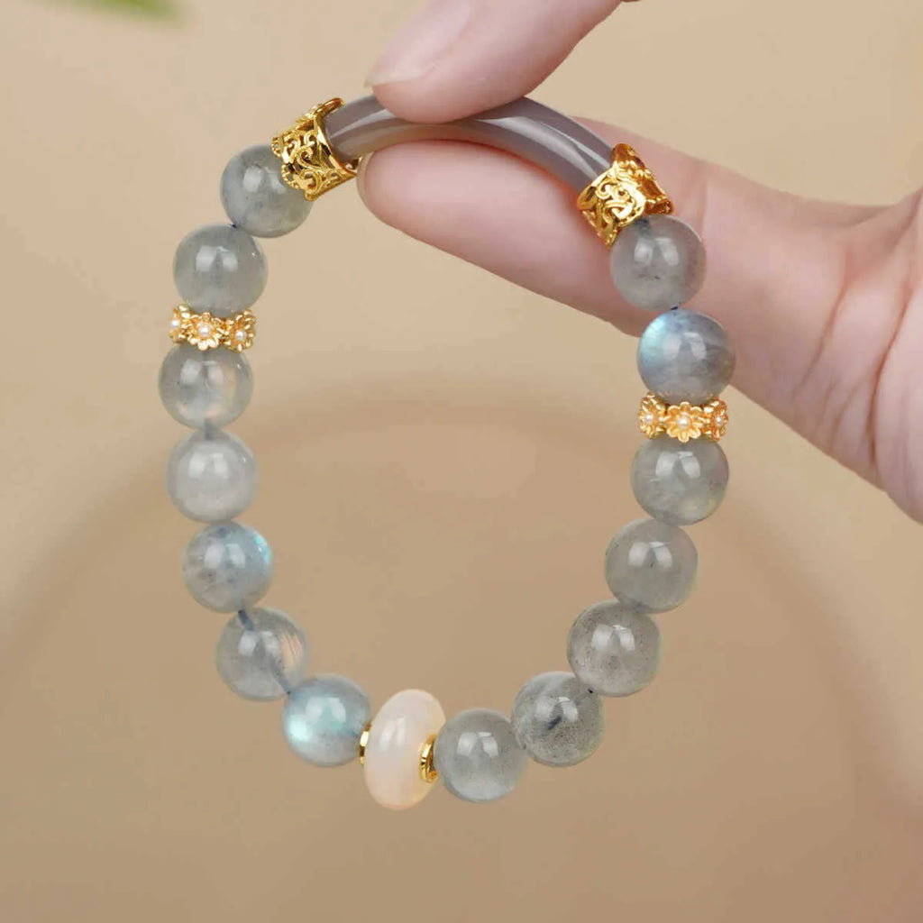 Emerald green Tian Shan Cui jade bracelet with floating flower girl half design and round elements
