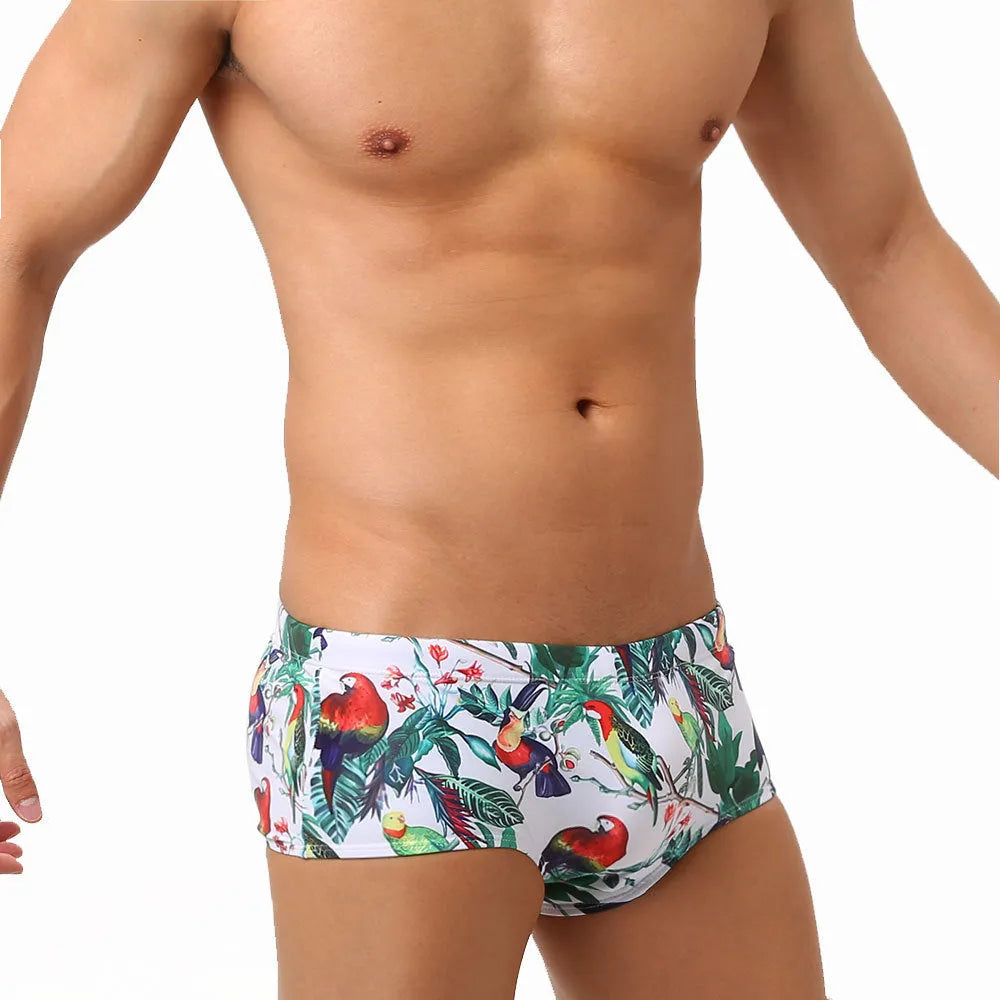 Men's floral and bird print swimming trunks in nylon fabric with elasticated waistband