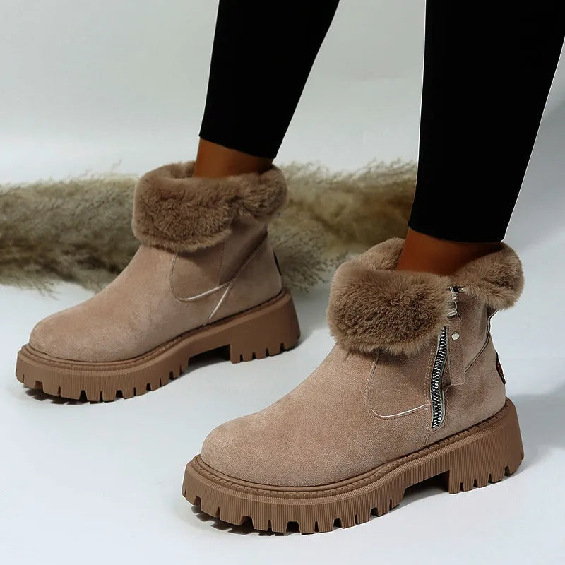 Women's black high-top snow boots with side zipper, plush lining, and non-slip rubber sole