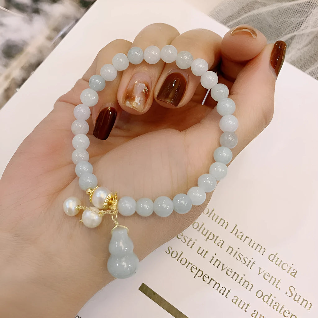 Handmade Chinese style jade bracelet with emerald colour, gourd design and pearl accents