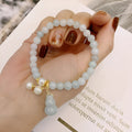 Handmade Chinese style jade bracelet with emerald colour, gourd design and pearl accents