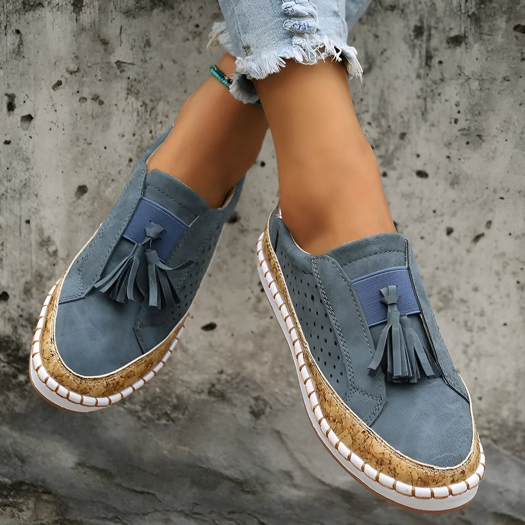 Women's casual tassel loafers with low heel, patent leather finish, round toe, and slip-on style in multiple colours