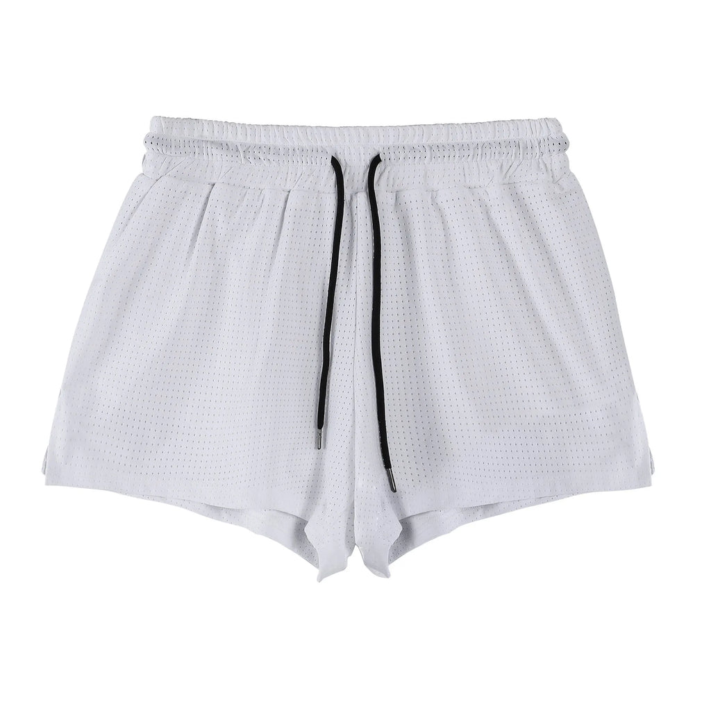 Men's black and white nylon quick-drying summer shorts on a size chart