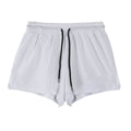 Men's black and white nylon quick-drying summer shorts on a size chart