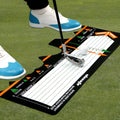 Black neoprene golf swing posture training pad on a practice mat.