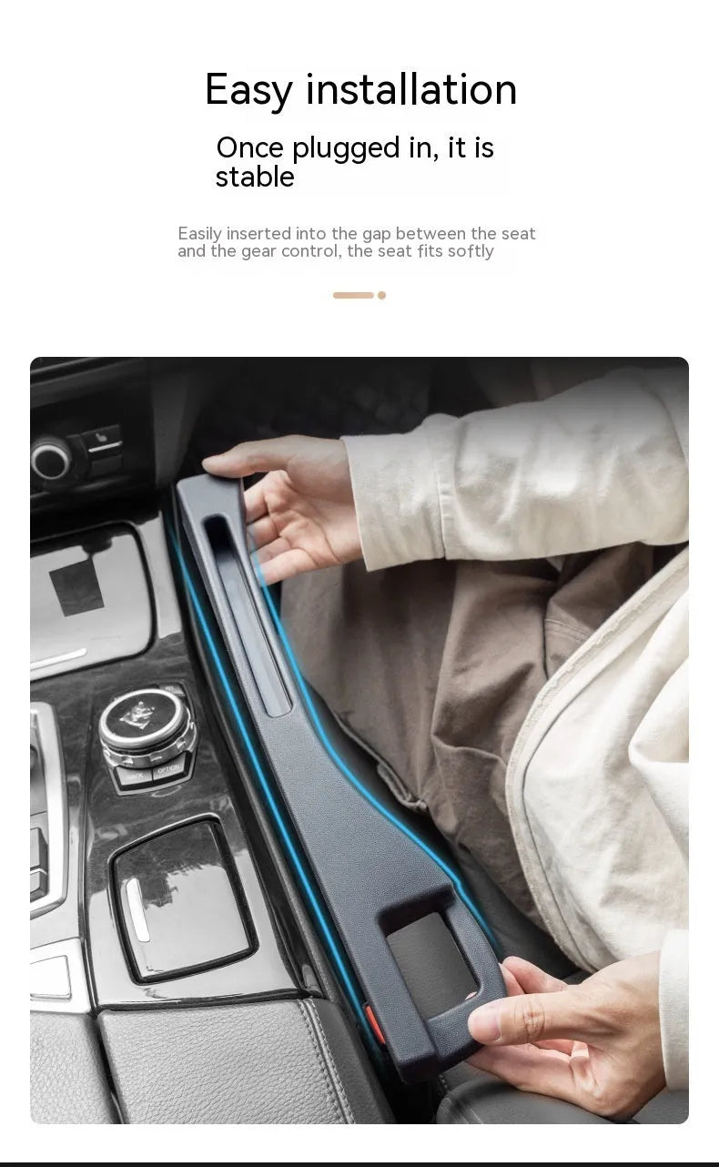 Black car gap storage box with handle placed between vehicle front seats