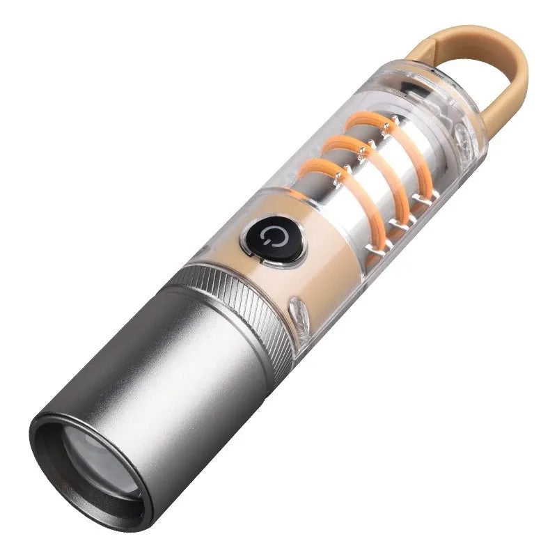 Orange 10W LED flashlight with optical zoom lens and keychain hook shown with USB charging cable