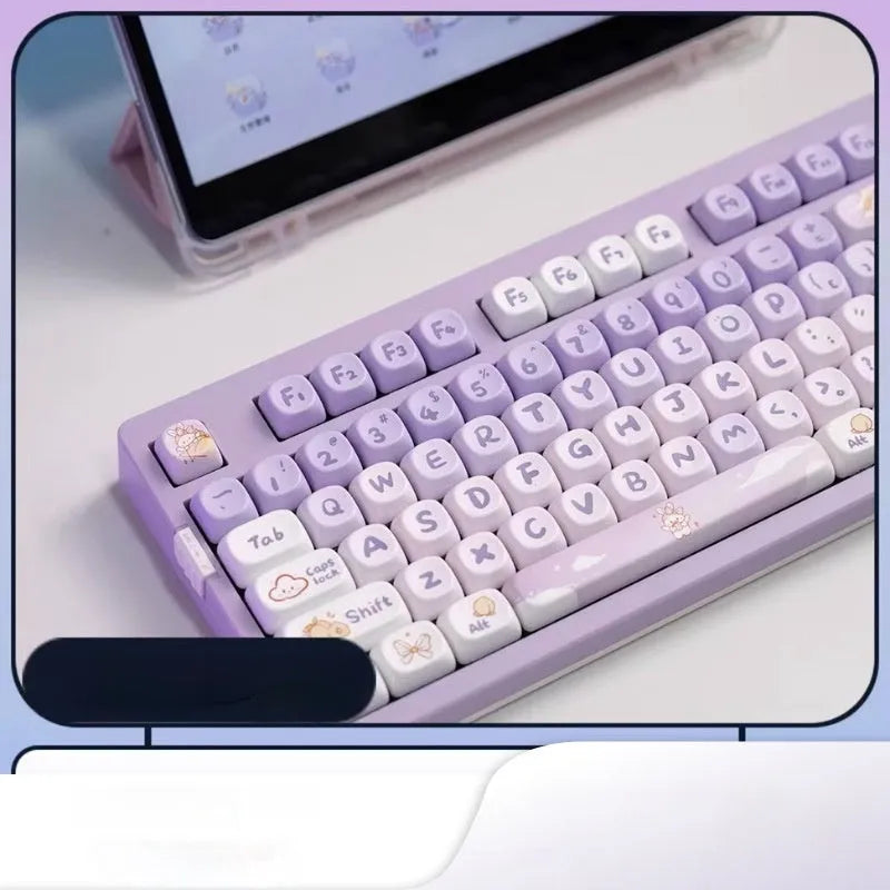 Close-up of purple gradient rabbit design on white PBT keycaps for mechanical keyboards.