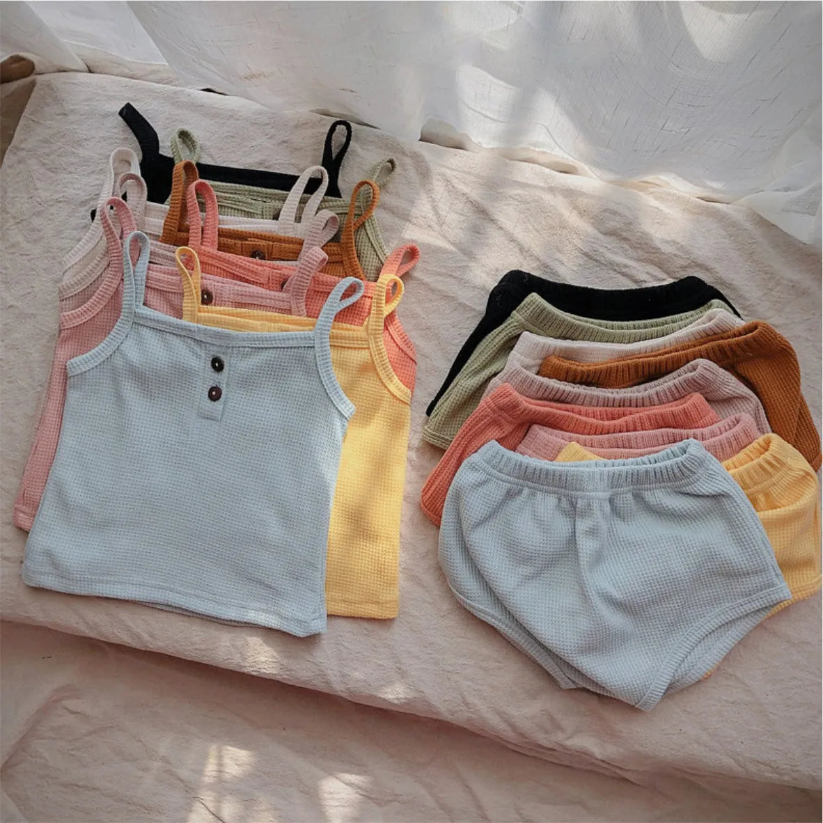 Summer baby camisole set with short sleeves and matching shorts in light yellow cotton fabric