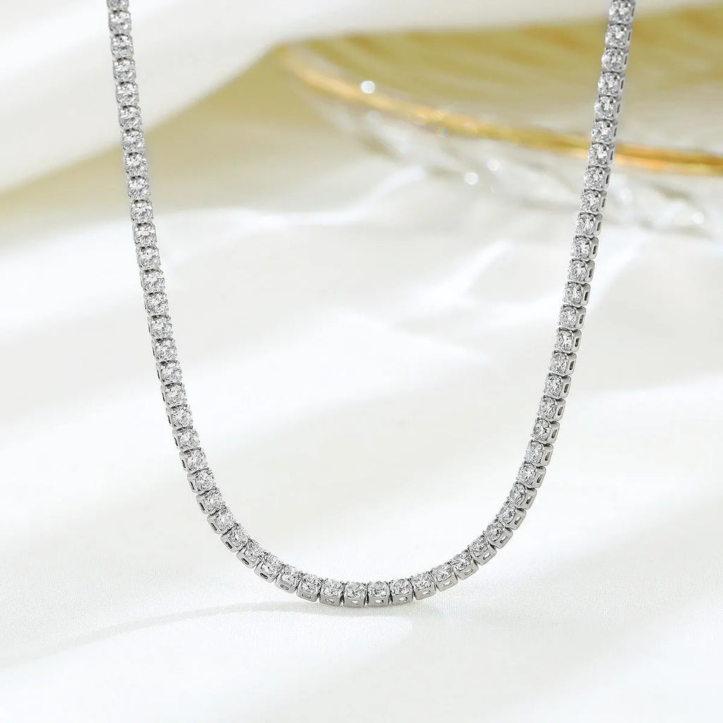 Women's sterling silver necklace with round design elements and diamond polishing treatment in silver colour