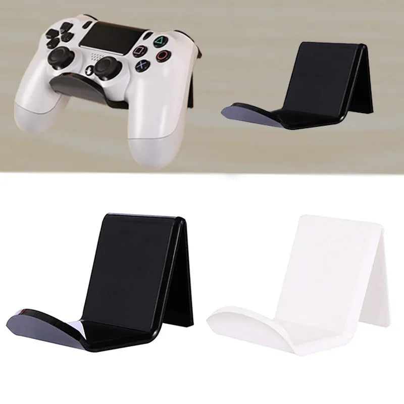 Universal plastic wall mount bracket holding a game controller, shown in black, white, and transparent colour options.
