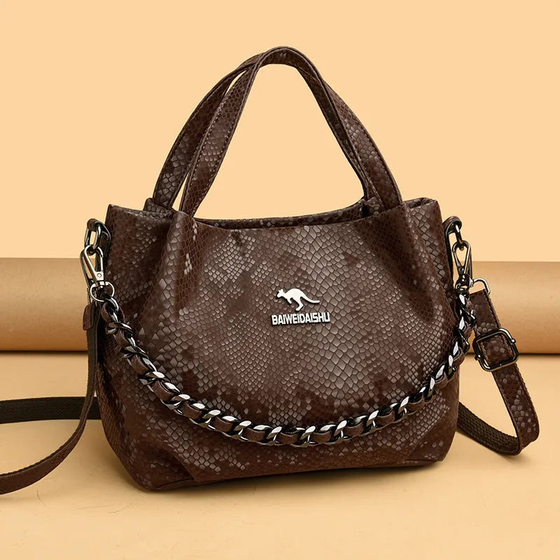 Genuine leather horizontal square shoulder bag with chain detail and snakeskin texture, multiple zippered compartments, available in various colours