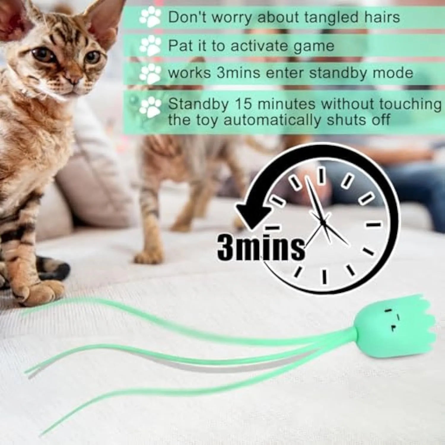 Rechargeable automatic cat toy with motorised swinging silicone tail on green background