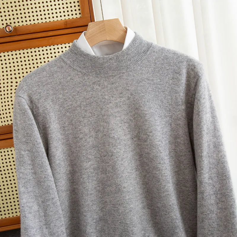 Men's half-collar wool sweater in loose fit showing colour options including black, brown and camel