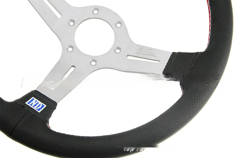 14-inch leather steering wheel with concave centre in black or silver skeleton options