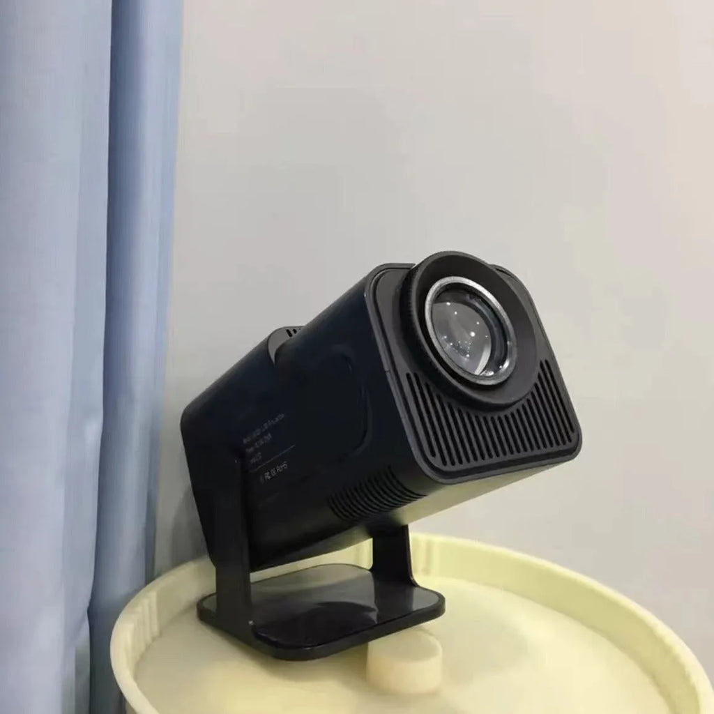 Home projector with wireless capability and screen handle for gaming and entertainment projection