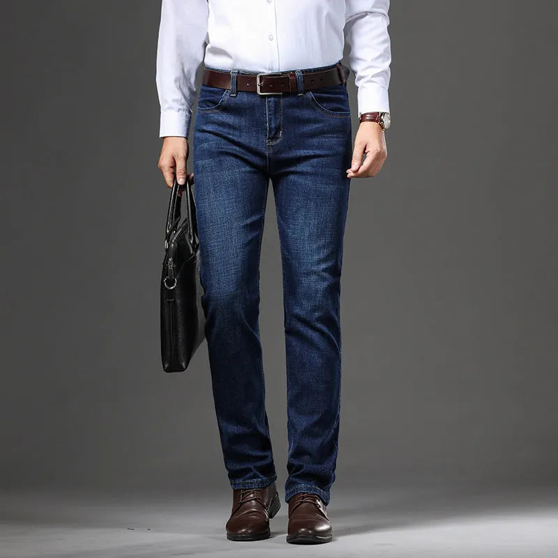 Women's straight-leg stretch jeans in mid-waist style with zip fly, available in black and blue