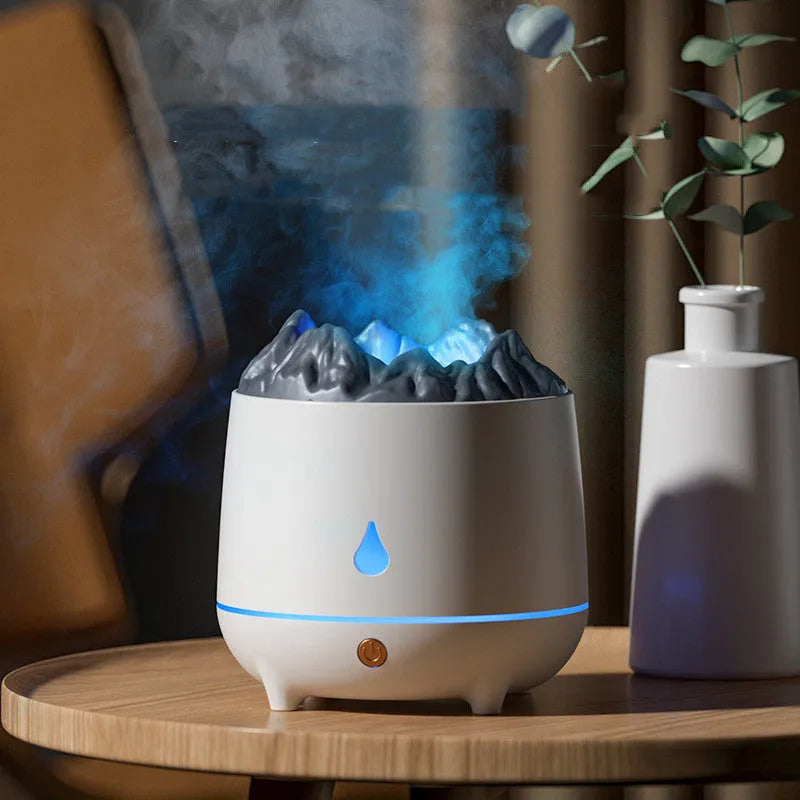 White Huoyanshan volcanic-shaped ultrasonic humidifier and aromatherapy diffuser on a table.