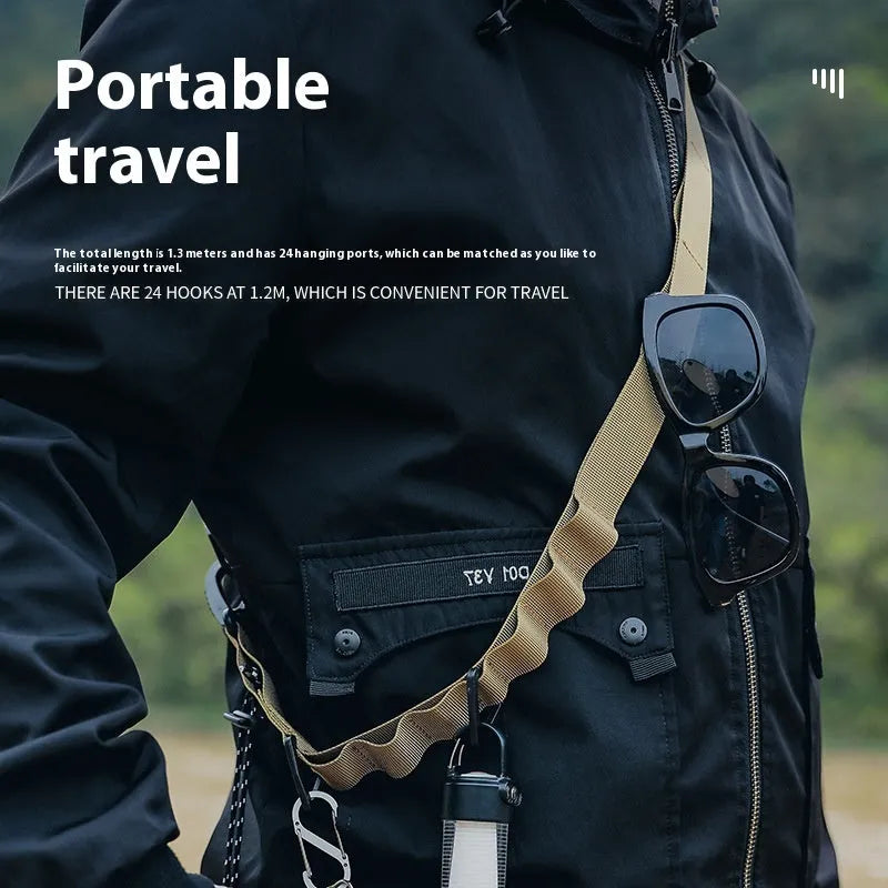 130cm black nylon outdoor hanging strap secured between two trees with laundry drying