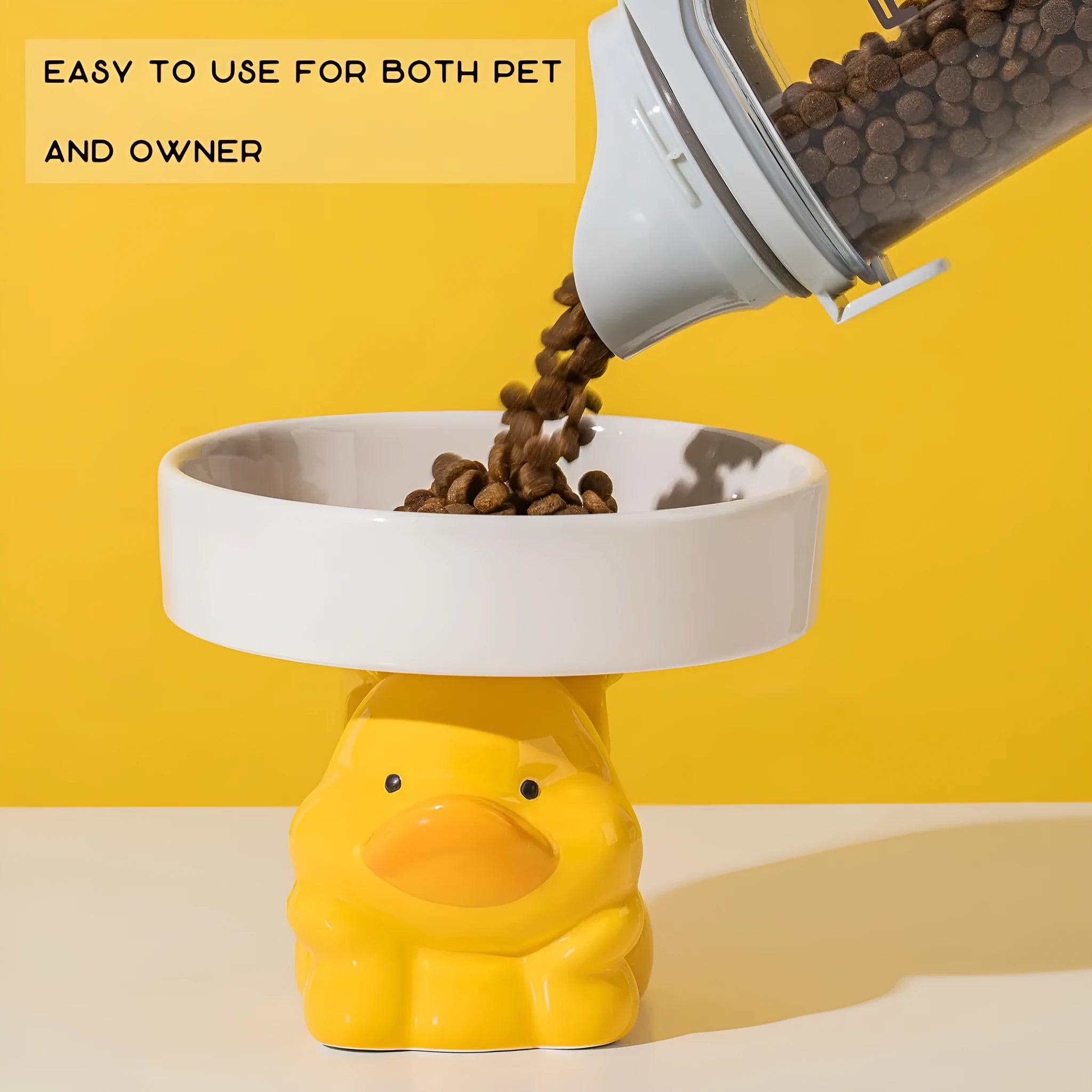 Ceramic elevated cat food bowl with animal theme design in pink, yellow, or white