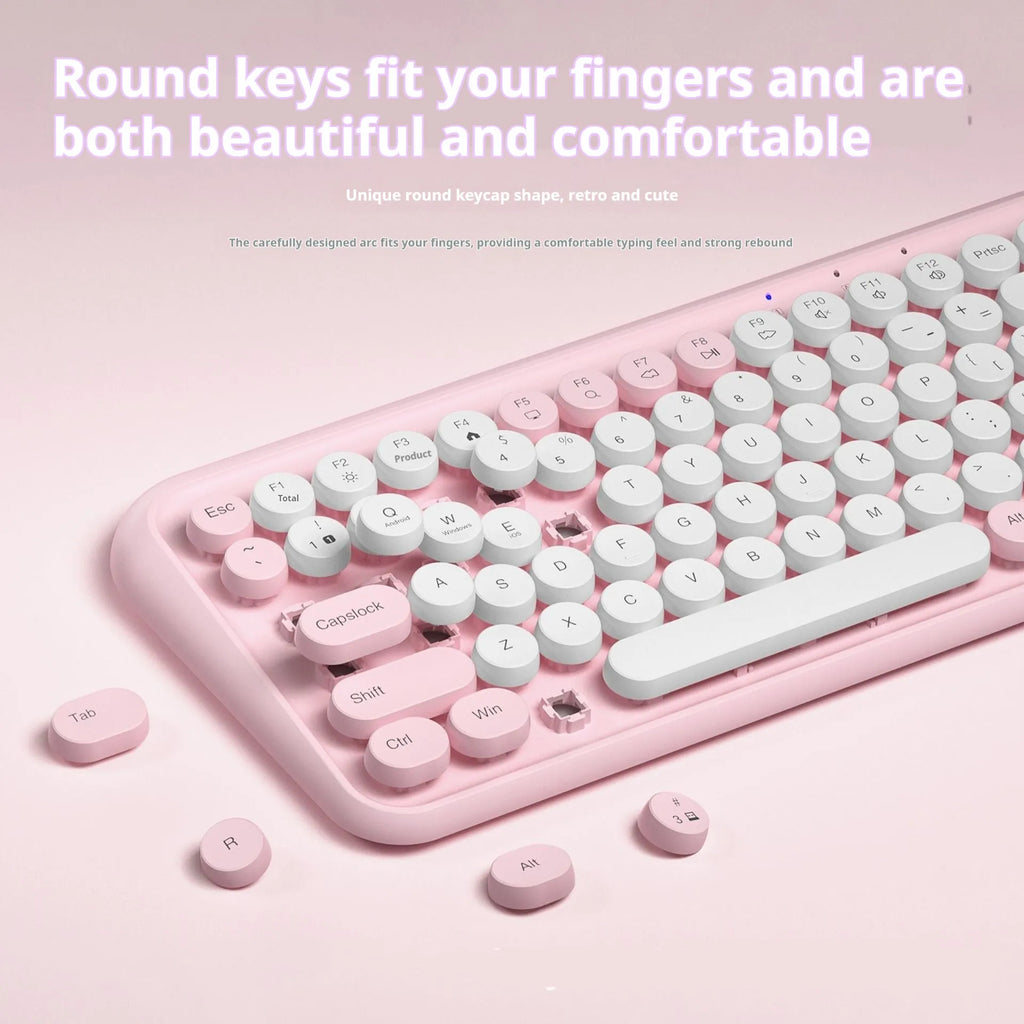 Pink portable Bluetooth keyboard with 84 keys and compact rectangular design
