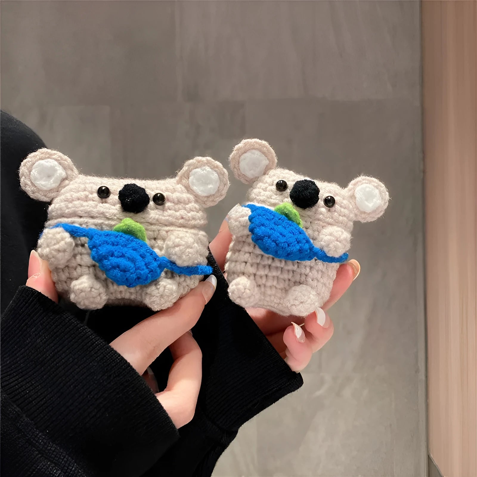 Hand-knitted koala bear backpack design cover for Apple AirPods and AirPods Pro charging case.