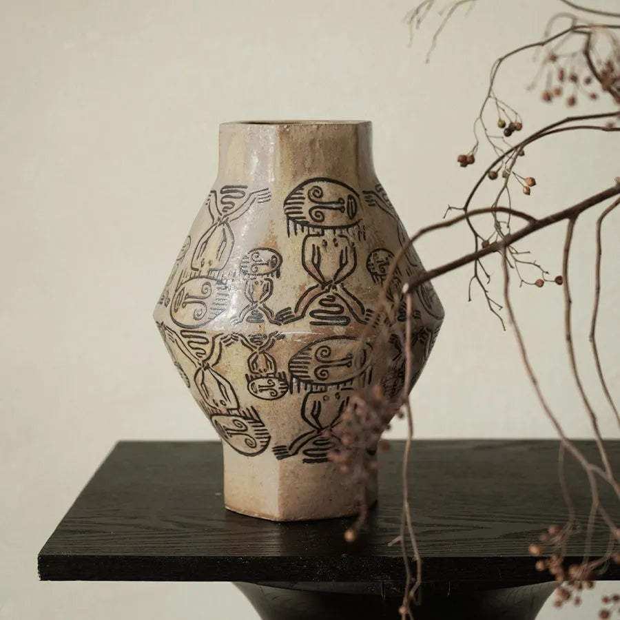 Hand-painted ceramic cylindrical vase with vintage carved art design in tribal totem flower colours