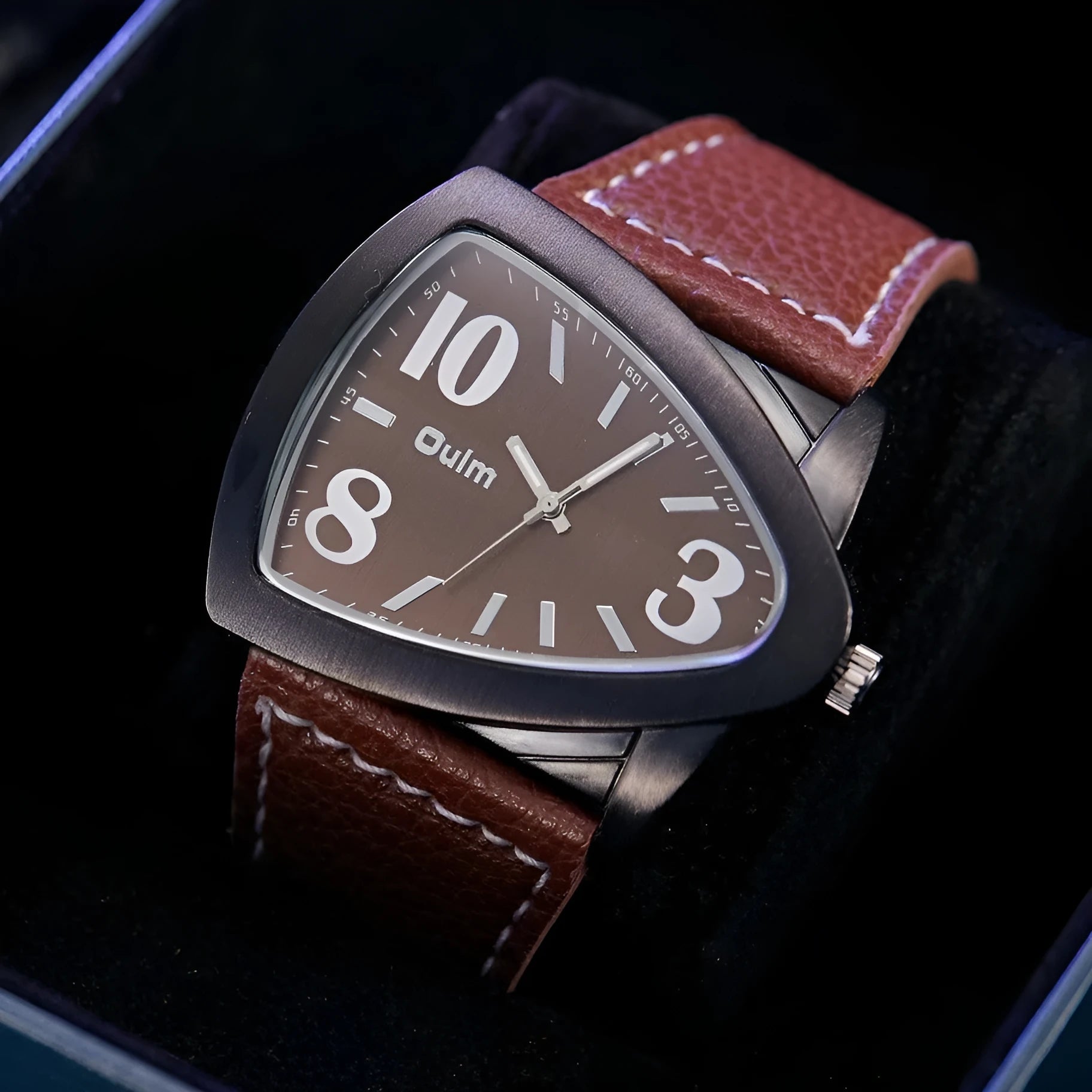 Men's casual watch with a distinctive triangular belt strap, shown in brown, black, and blue colour options.