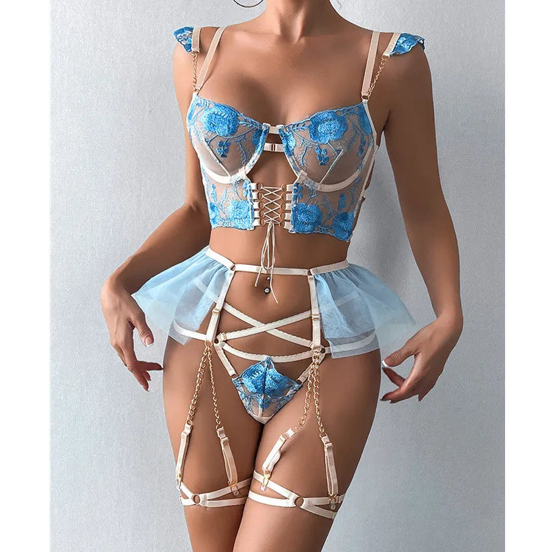 Light blue embroidered lace women's bra and panty set with transparent push up design and mesh detail.