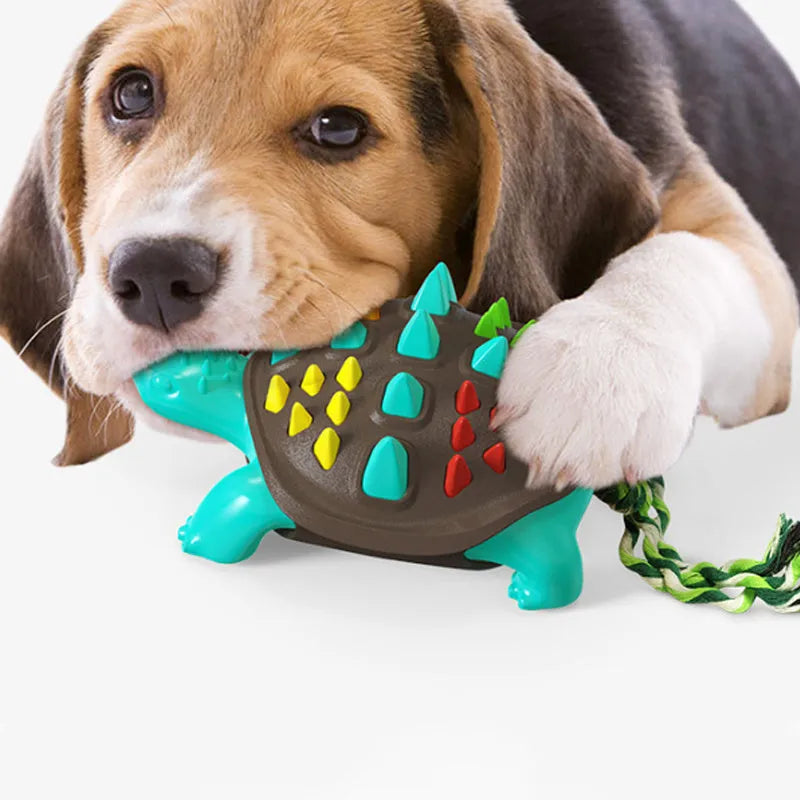 Natural rubber dog toothbrush chew toy with dinosaur knot tail in various colour options