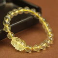 Yellow leather cord Pi Xiu bracelet with artificial crystal charms in simple Chinese style