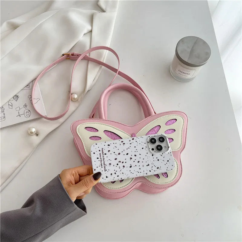 Square-shaped crossbody bag in PU leather with contrast detailing showing front view