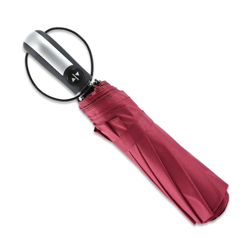 Automatic opening triple-fold business sun-shade umbrella in black colour with steel ribs and rubber handle