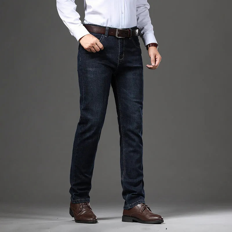 Women's straight-leg stretch jeans in mid-waist style with zip fly, available in black and blue