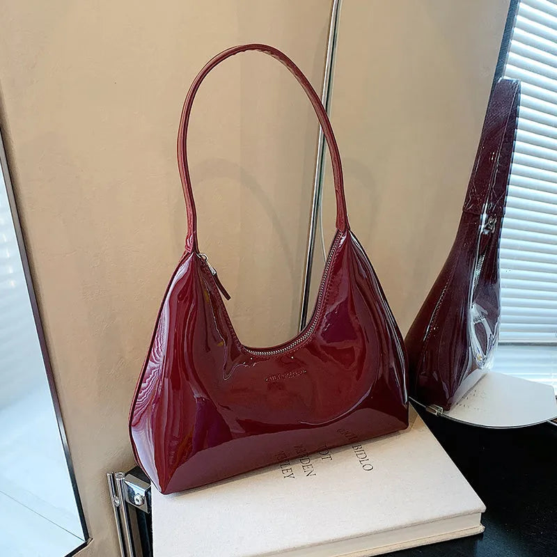 French style PU leather shoulder bag with sewing line detail and dumpling shape, available in multiple colours