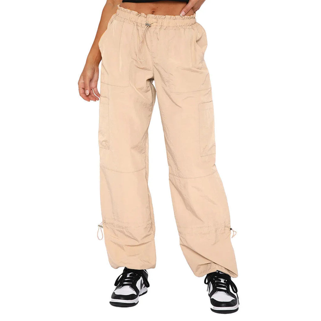 Loose-fit straight leg cargo pants with multiple pockets in a grey colour.
