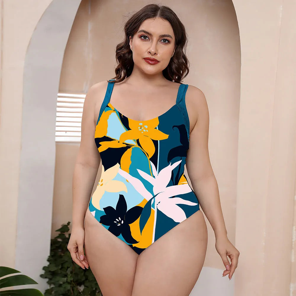 Conservative vest-style one-piece swimsuit with spaghetti straps and a floral print pattern.
