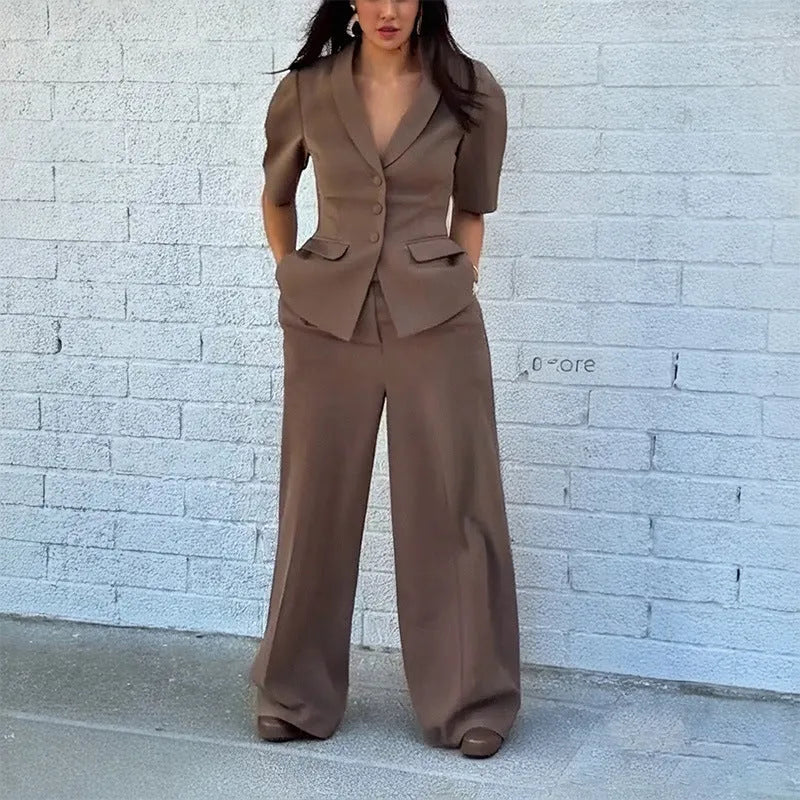 Brown polyester men's suit with slim fit waist, long sleeves, and matching trousers