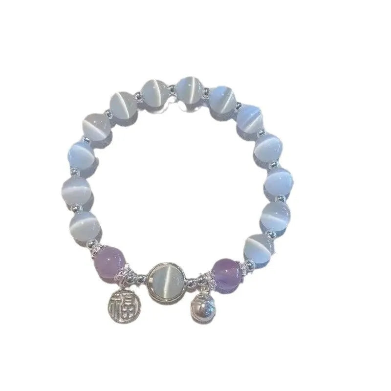 Glass bracelet with butterfly design and blessing card beads in moonlight colours