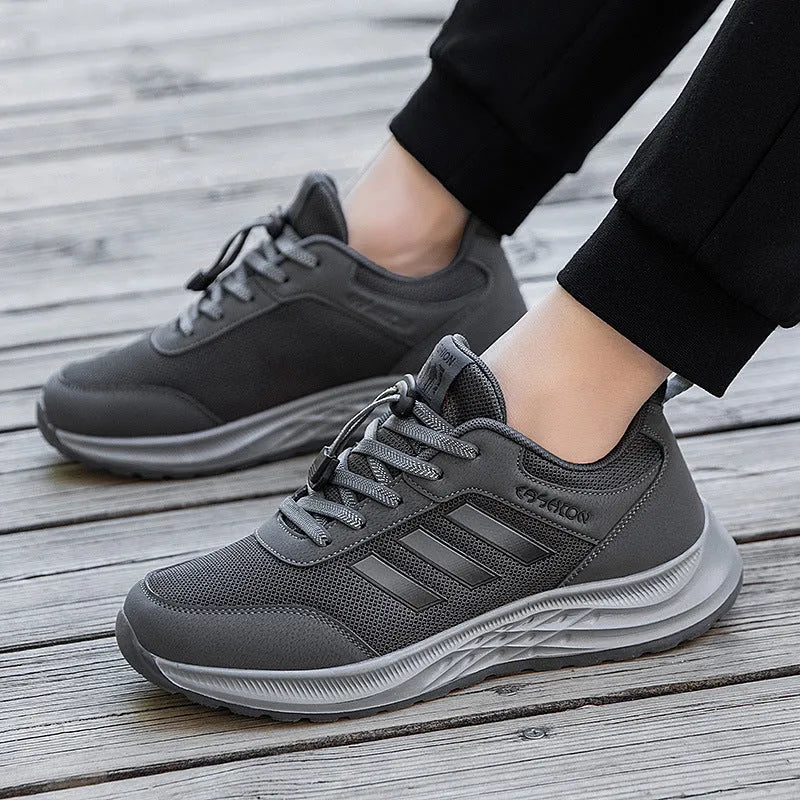Breathable mesh casual shoes with elastic band closure in black, dark grey, purple and purplish red.
